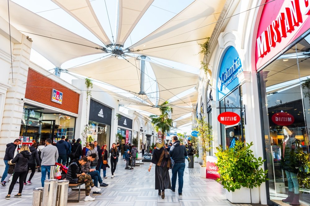 People shop in the Viaport Marina Outlet Shopping Mall in Tuzla, Istanbul, Türkiye, April 21, 2019. (Shutterstock)