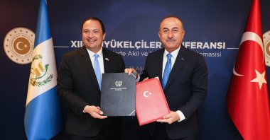 Foreign Minister Mevlüt Çavuşoğlu (R) and Guatemalan Foreign Minister Mario Adolfo Bucaro Flores (L) come together at the 13th Ambassadors' Conference in the capital Ankara, Türkiye, Aug.11, 2022. (AA Photo)