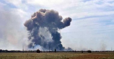 A handout picture made available by the Department of Information and Press Service of the Head of the Republic of Crimea shows smoke rising after blasts at the Saki airfield near the Novofedorovka settlement, Crimea, Aug. 9, 2022. (EPA Photo)