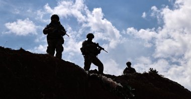 Turkish soldiers stand guard in the province of Van, eastern Türkiye, Aug. 12, 2021. (AA Photo)