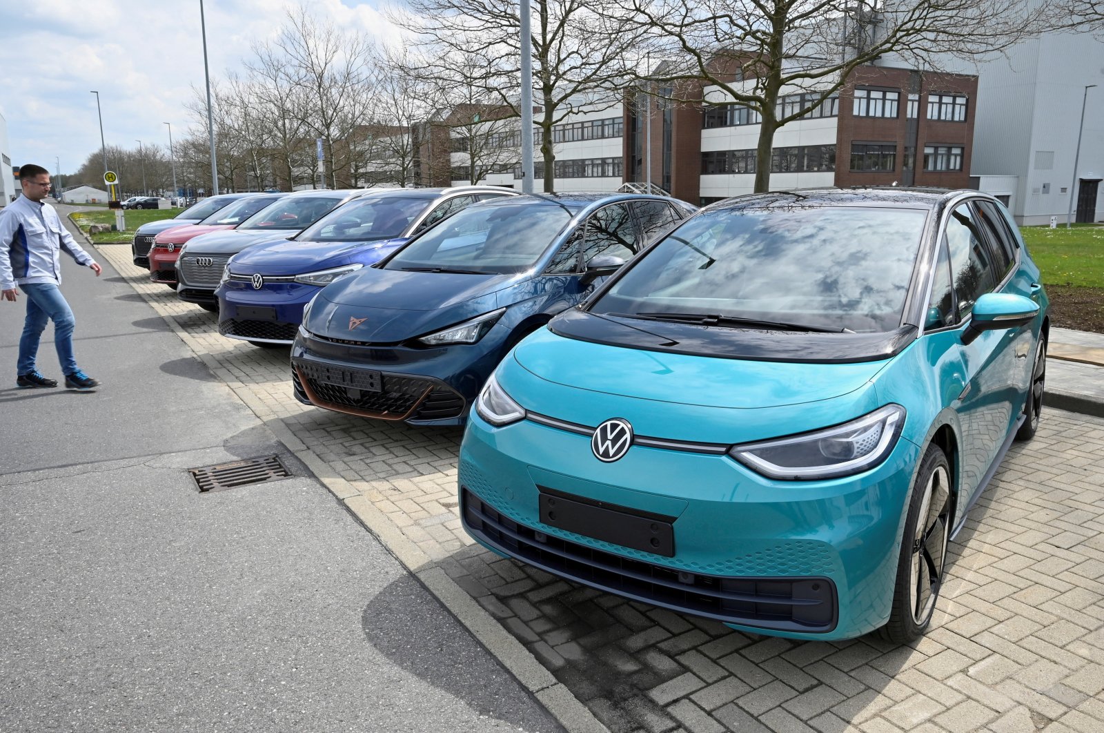 Electric car models of the Volkswagen Group Volkswagen ID.3, Seat Cupra Born, Volkswagen ID.4, Audi Q4 e-tron, Volkswagen ID.5 GTX and Audi Q4 Sportback e-tron are parked outside the production plant of Volkswagen, in Zwickau, Germany, April 26, 2022. (Audi File Photo)
