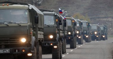 Trucks of the Russian peacekeeping forces drive along a road near Lachin in the region of Nagorno-Karabakh, Nov. 13, 2020. (Reuters File Photo)
