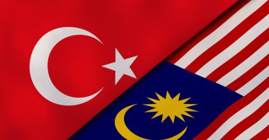The states flags of Turkey (L) and Malaysia. (Shutterstock File Photo)