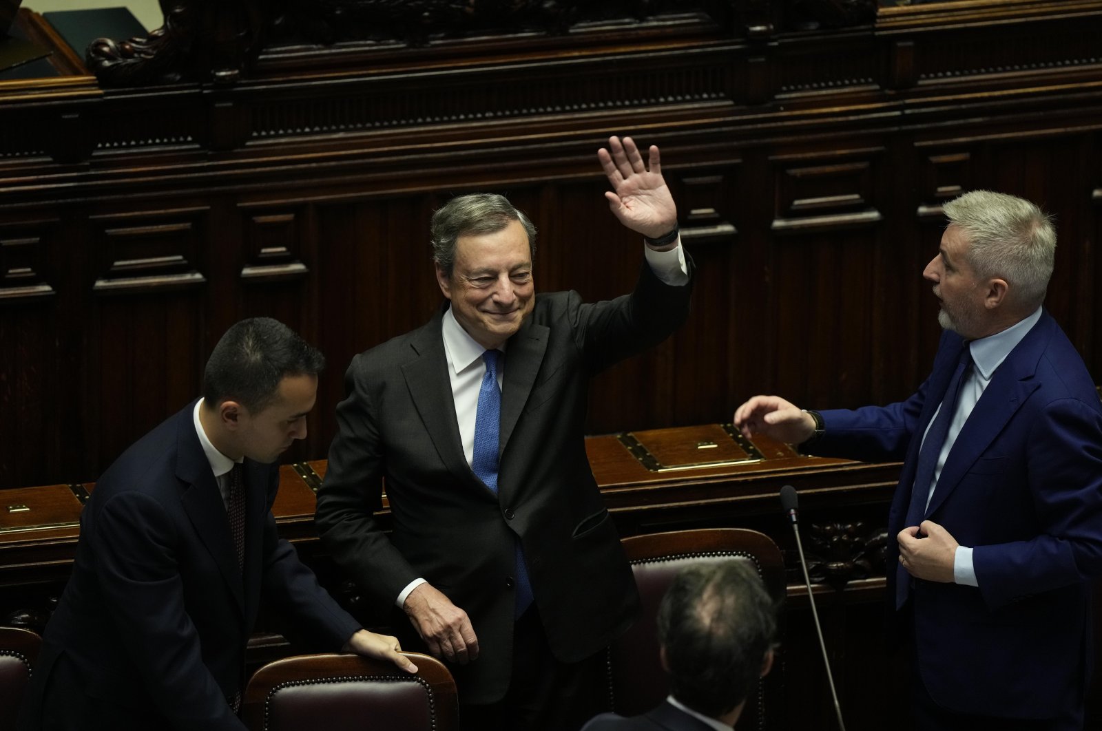 Italian Premier Mario Draghi waves to lawmakers at the end of his address at the Parliament in Rome, Italy, July 21, 2022. (AP Photo)