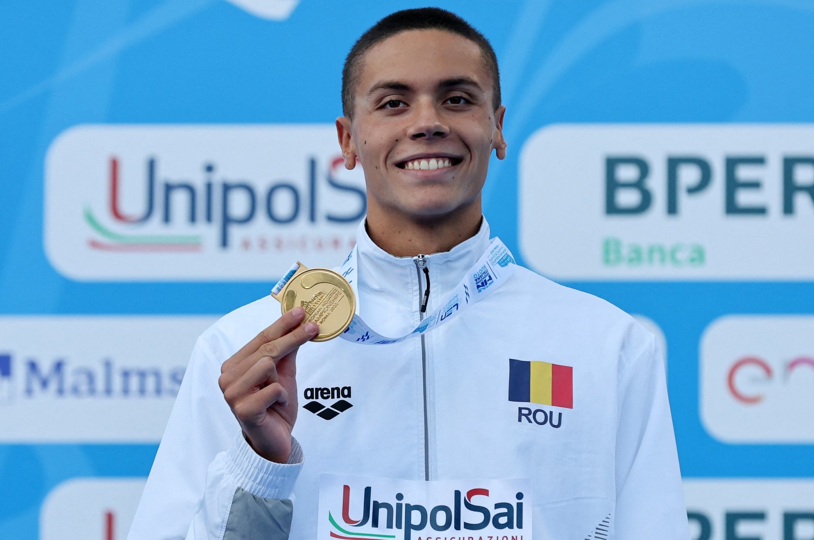 Remaja Rumania Popovici memecahkan rekor gaya bebas 100m dunia