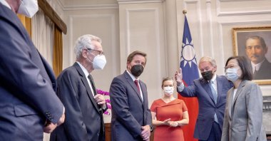 Taiwan President Tsai Ing-wen (R) is escorted by U.S. Senator ED Markey (2nd-R) to greet a delegation of U.S. representatives at the Presidential Office in Taipei, Taiwan, Aug. 15, 2022. (Taiwan’s Presidential Office via AFP)