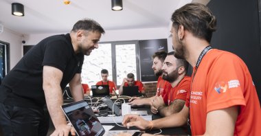 Ali Taha Koç, head of the Presidency&#039;s Digital Transformation Office speaks to HackKaradeniz competitors in Zonguldak, northern Türkiye, Aug. 14, 2022. (Courtesy of Digital Transformation Office)