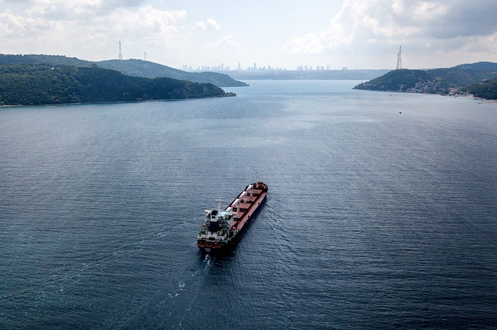 The Sierra Leone-flagged cargo vessel Razoni sails along the Bosporus Strait, Istanbul, Türkiye, Aug. 3. (AFP Photo)
