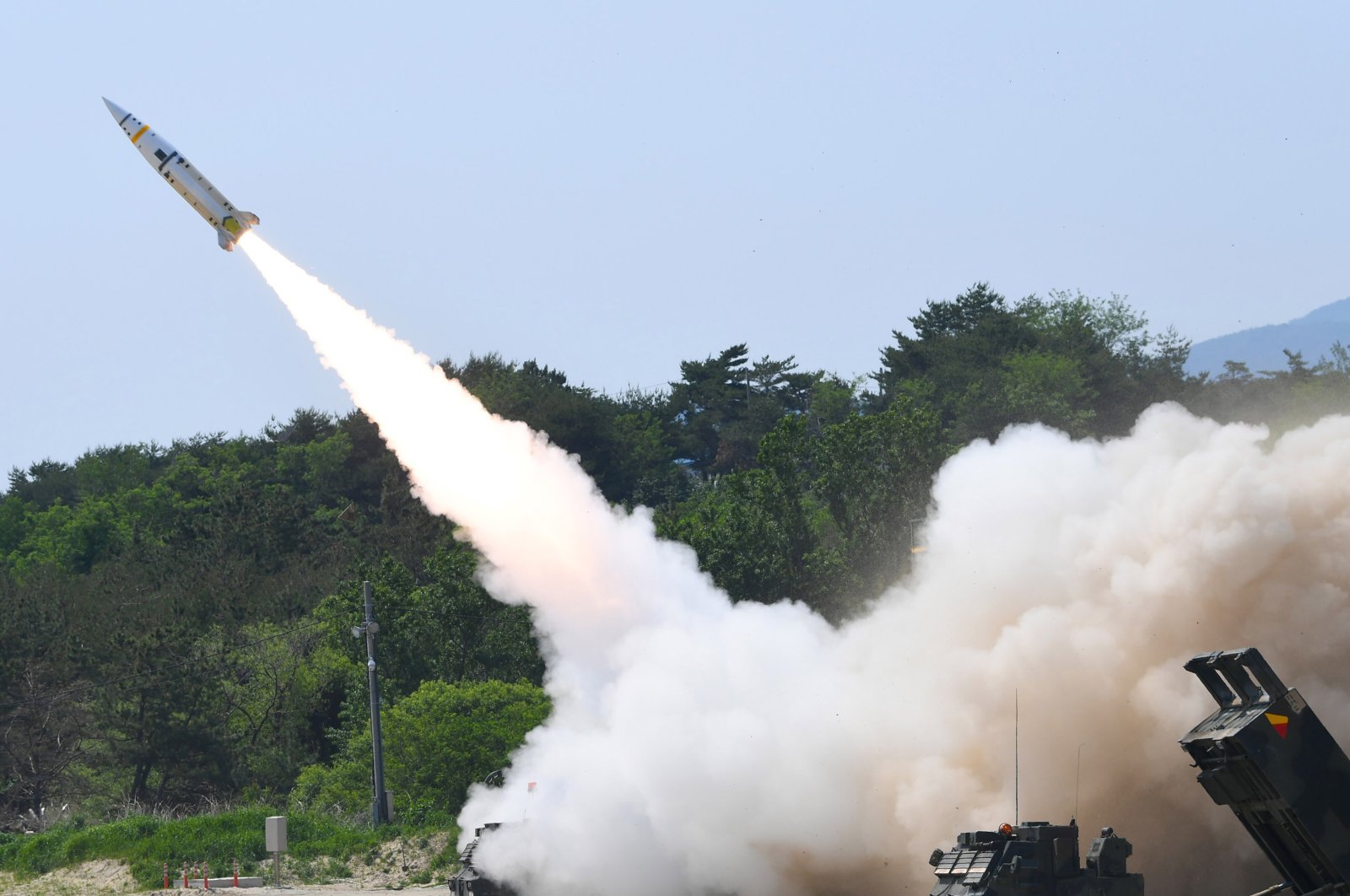 In this photo provided by South Korea Defense Ministry, a missile is fired during a joint training between U.S. and South Korea at an undisclosed location in South Korea, May 25, 2022. (AP Photo)