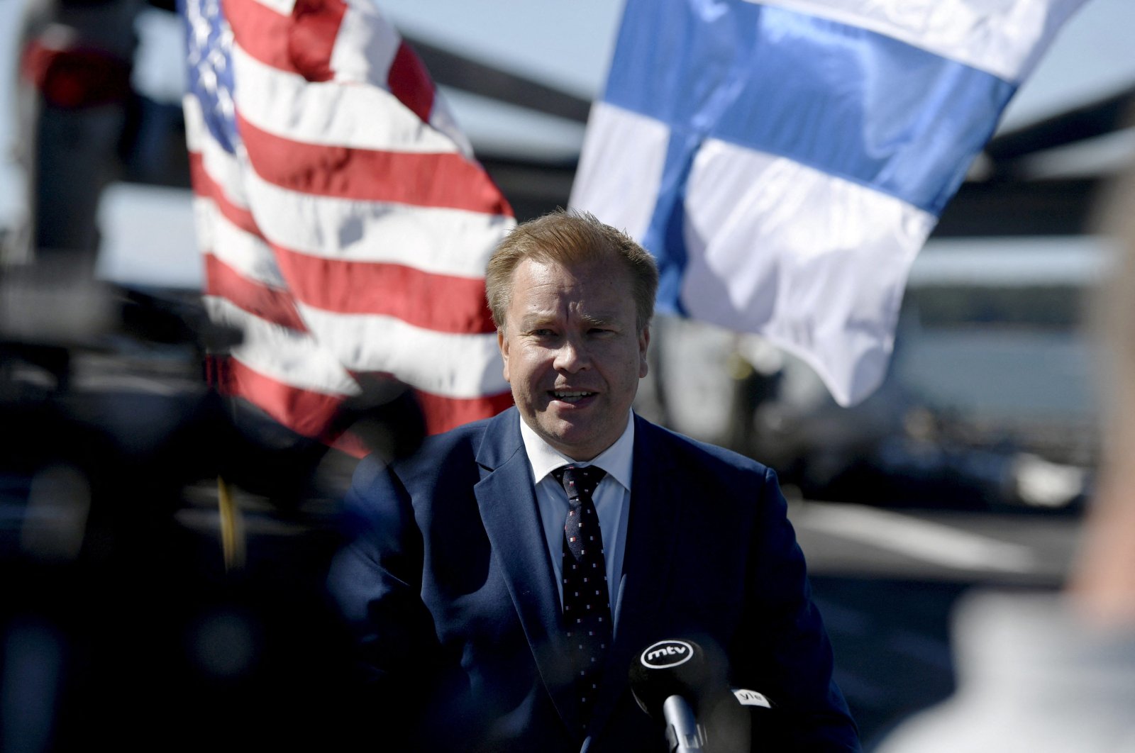 Finland&#039;s Defense Minister Antti Kaikkonen speaks to the media when members of the media visit the Wasp-class amphibious assault ship USS Kearsarge of the United States Navy in the Hernesaari Harbour in Helsinki, Finland, Aug. 7, 2022. (Reuters Photo)