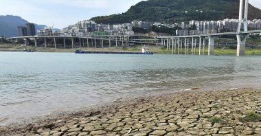 A dried riverbed is exposed after the water level drops in the Yangtze River in Yunyang county in southwest China&#039;s Chongqing municipality, Aug. 16, 2022. (AP Photo)
