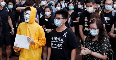 Hong Kong activist dubbed "Captain America 2.0" Ma Chun-man attends a vigil for a protester Marco Leung Ling-kit who fell to his death during a demonstration outside the Pacific Place mall, in Hong Kong, China, June 15, 2020. (Reuters Photo)