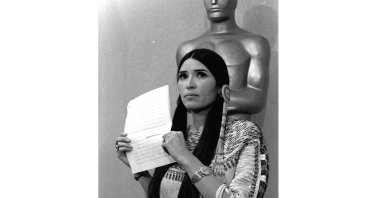 Sacheen Littlefeather appears at the Academy Awards ceremony to announce that Marlon Brando was declining his Oscar as best actor for his role in "The Godfather," on March 27, 1973. (AP)
