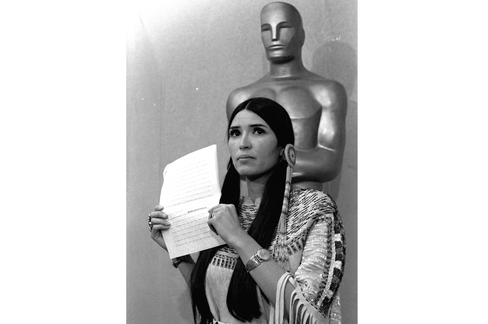 Sacheen Littlefeather appears at the Academy Awards ceremony to announce that Marlon Brando was declining his Oscar as best actor for his role in &quot;The Godfather,&quot; on March 27, 1973. (AP)