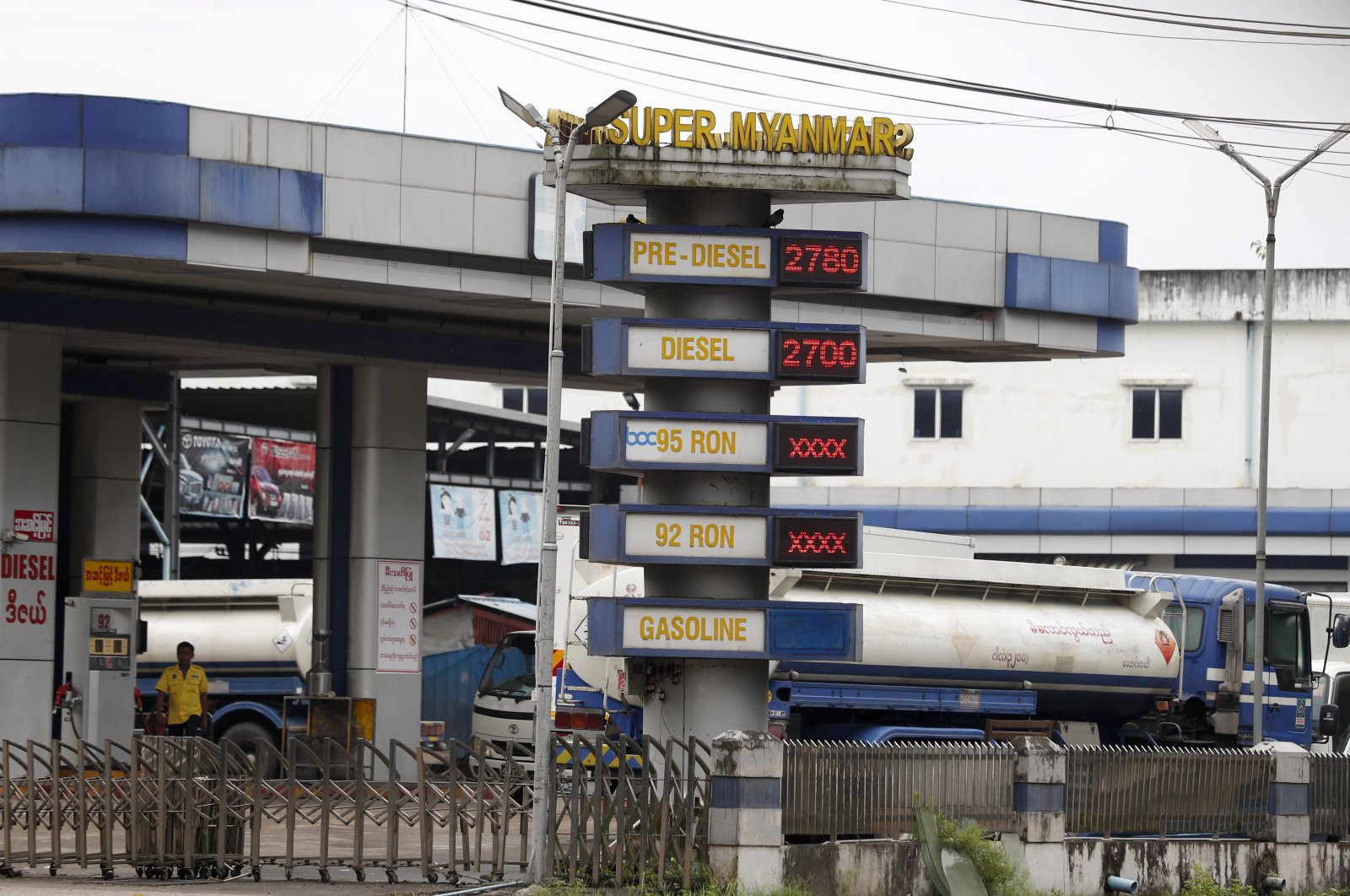 A sign shows prices for various automotive fuels at a gas station in Yangon, Myanmar, Aug. 16, 2022. (EPA Photo)