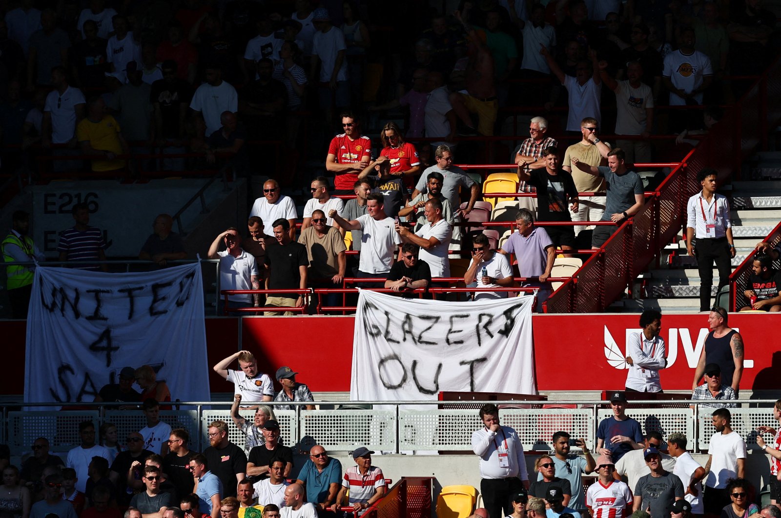 Man Utd fans display banners in protest of the Glazer family’s ownership of the club before a Premier League match against Brentford, London, England, Aug. 13, 2022. (Rueters Photo)
