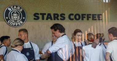Staff members get ready for the launch of the new coffee shop "Stars Coffee," which opens following Starbucks Corp's exit from the Russian market, Moscow, Russia, Aug. 18, 2022.  (Reuters Photo)