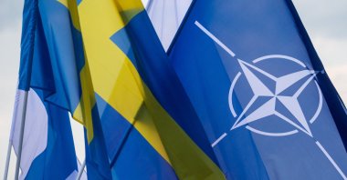 Swedish, Finnish and NATO flags can be seen on board the Polish Navy frigate ORP Kosciuszko in Gdynia, Poland, July 22, 2022. (AFP Photo)