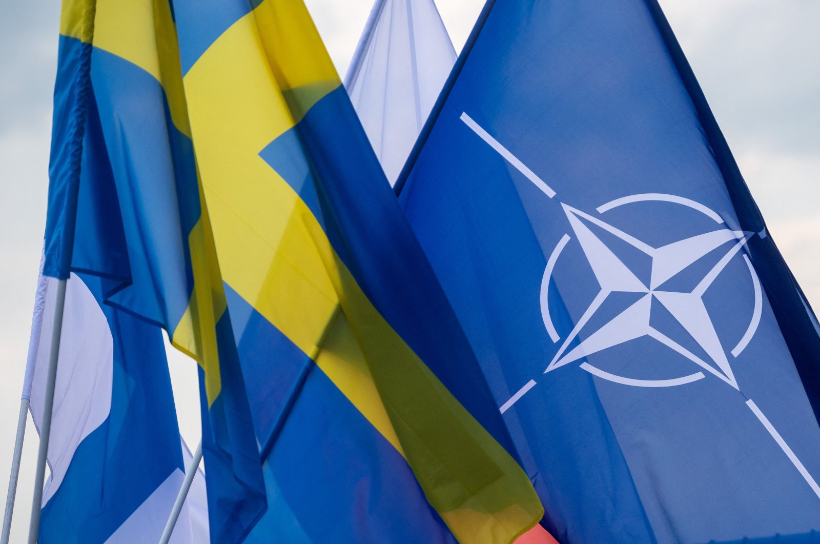 Swedish, Finnish and NATO flags can be seen on board the Polish Navy frigate ORP Kosciuszko in Gdynia, Poland, July 22, 2022. (AFP Photo)