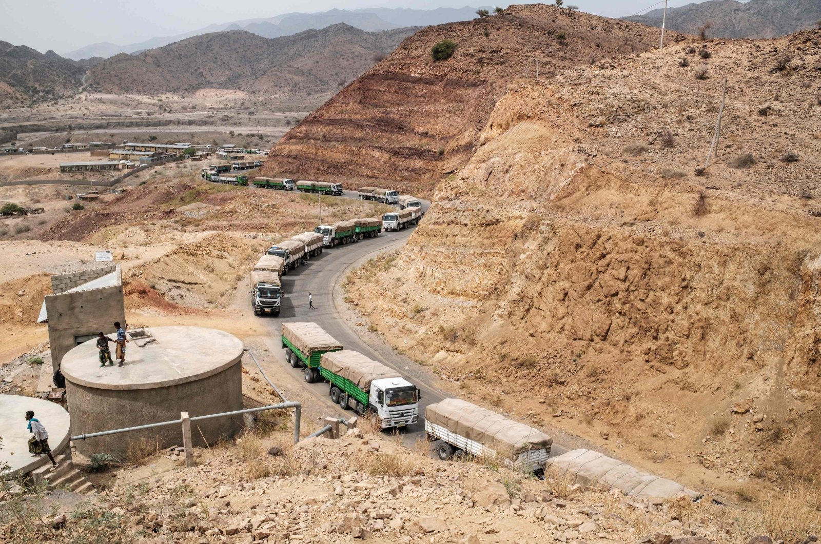 A convoy of World Food Programme (WFP) trucks on their way to Tigray are seen in the village of Erebti, Ethiopia, June 9, 2022. (AFP Photo)