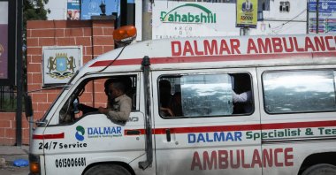 An ambulance is seen near the site of explosions in Mogadishu, Somalia, Aug. 20, 2022. (AFP Photo)