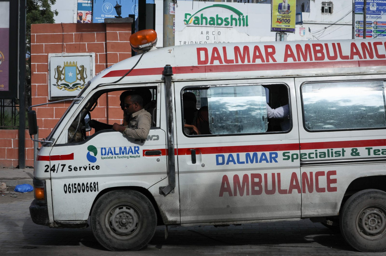 An ambulance is seen near the site of explosions in Mogadishu, Somalia, Aug. 20, 2022. (AFP Photo)