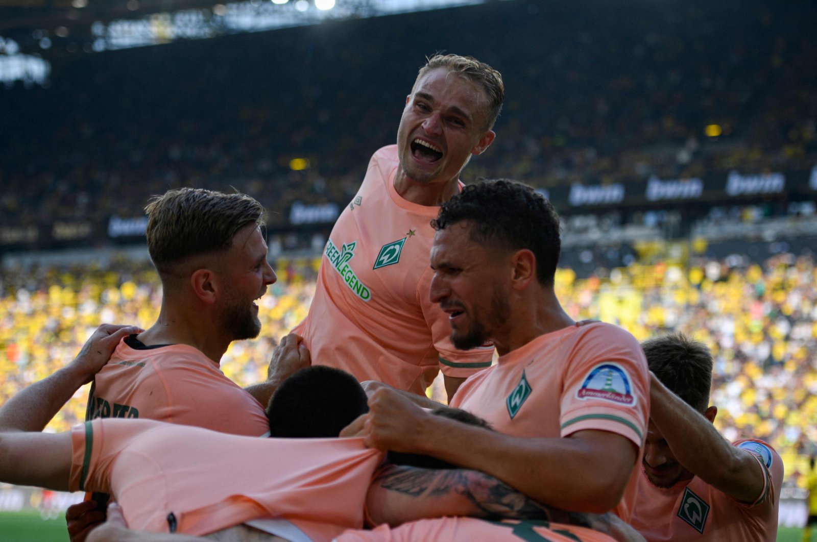 Werder Bremen players celebrate their third goal in the Bundesliga football match between Borussia Dortmund and SV Werder Bremen in Dortmund, western Germany, Aug. 20, 2022. (AFP Photo)