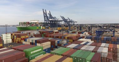 Shipping containers remain at the Port of Felixstowe in Suffolk, U.K., Aug. 21, 2022. (AP Photo)