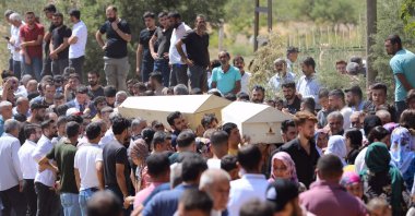 People attend the funeral procession of two traffic accident victims, Mardin, Türkiye, Aug. 21, 2022. (AA Photo)