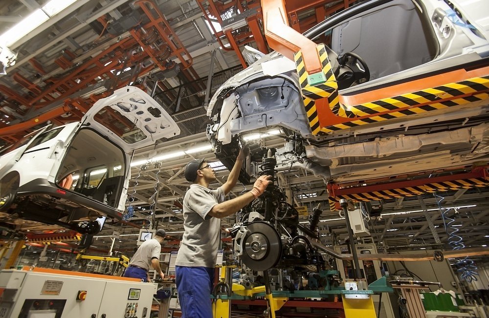 An employee works at the Ford car factory in Izmit, Türkiye, Dec. 17, 2014.