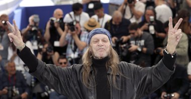 Actor Leon Vitali poses for photographers at the photo call for the film "The Shining" at the 72nd international film festival, Cannes, southern France, May 16, 2019.  (AP Photo)