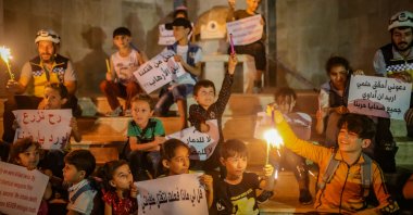 People remember the victims of the Ghouta massacre on its ninth anniversary, Idlib, Syria, Aug. 21, 2022. (AA)