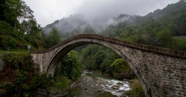 Historical Ottoman bridge in Şenyuva, Cinciva in Armenian, over the Fırtına river near Çamlıhemşin, Rize, eastern end of Türkiye. (Shutterstock Photo)