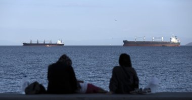 People watch the Marmara Sea, in Istanbul, Türkiye, July 13, 2022. (AP PHOTO)