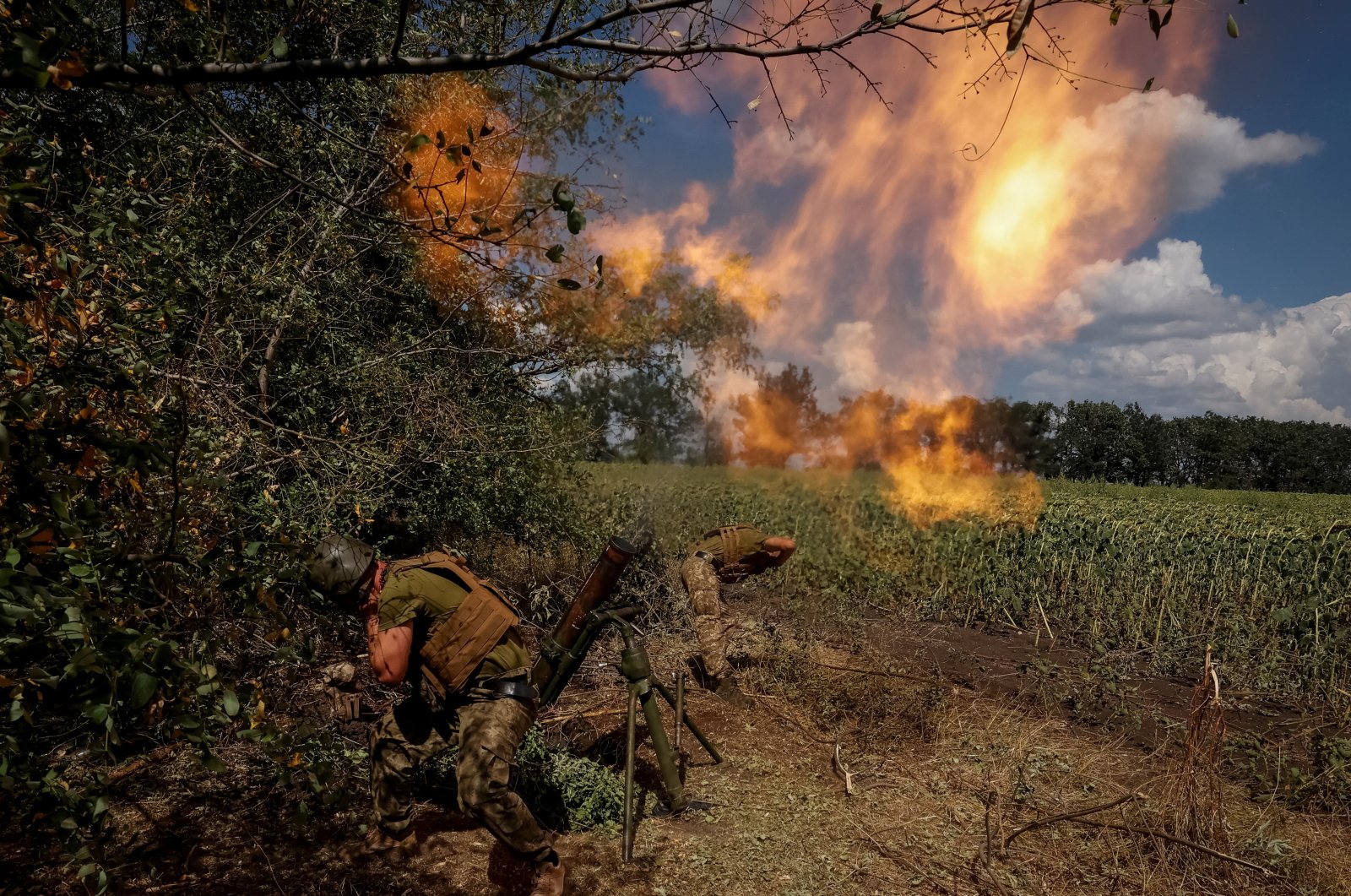 Ukrainian soldiers fire a mortar on a front line, in the Donetsk region, Ukraine, Aug. 18, 2022. (Reuters Photo)
