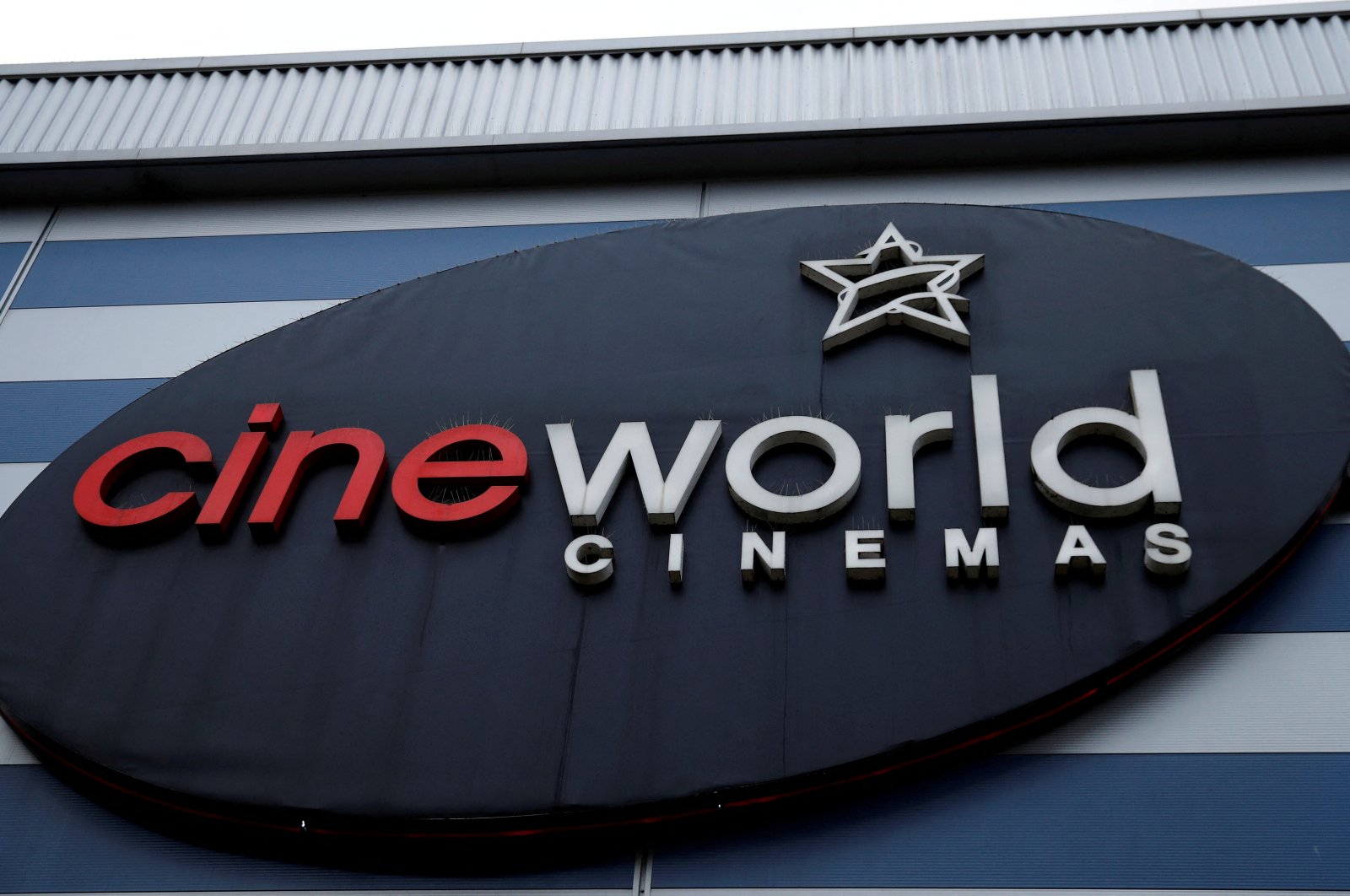 FILE PHOTO: Signage is seen outside a Cineworld cinema following the outbreak of the coronavirus disease (COVID-19) in Manchester, Britain, October 4, 2020. REUTERS/Phil Noble/File Photo