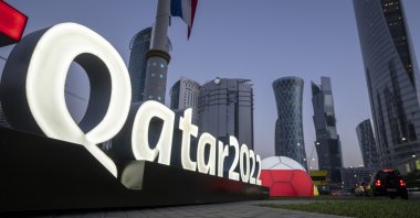 Branding is displayed near the Doha Exhibition and Convention Center, in Doha, Qatar, March 31, 2022. (AP Photo)