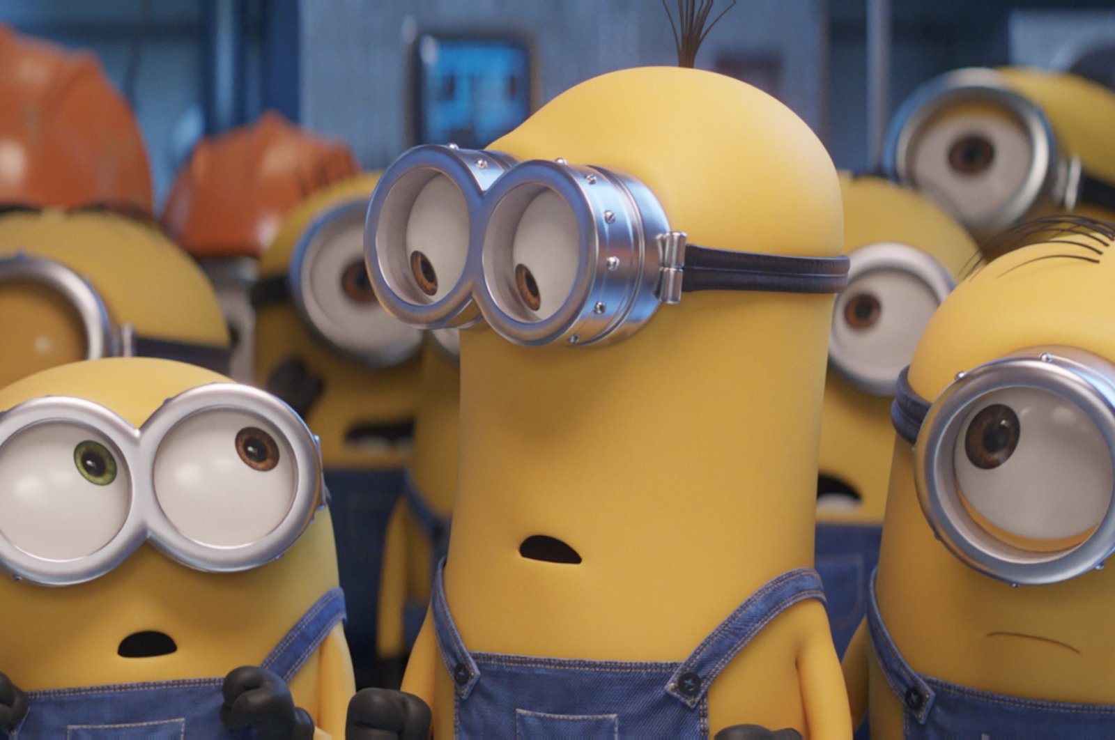This image released by Universal Pictures shows characters, foreground from left, Bob, Kevin and Stuart in a scene from &quot;Minions: The Rise of Gru.&quot; (AP Photo)