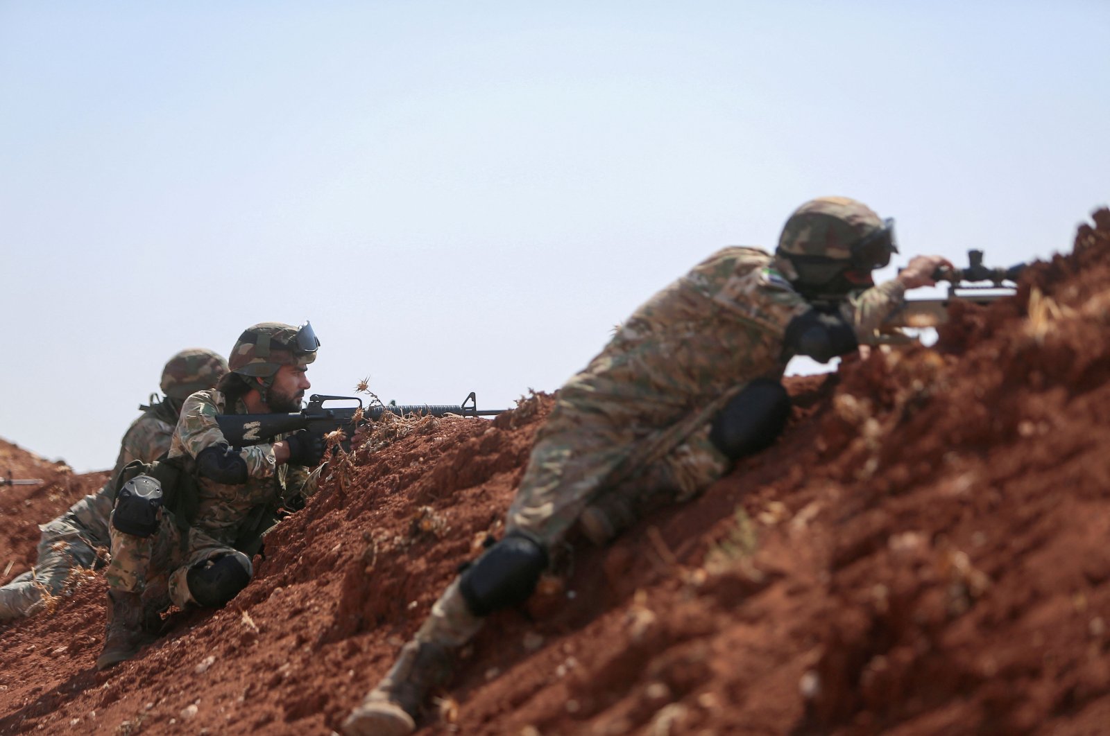 Türkiye-backed Syrian opposition forces are stationed at a position on the outskirts of the town of Marea, in the northern Aleppo countryside, along the frontline with areas held by YPG terrorists, Syria, Aug. 20, 2022. (AFP Photo)