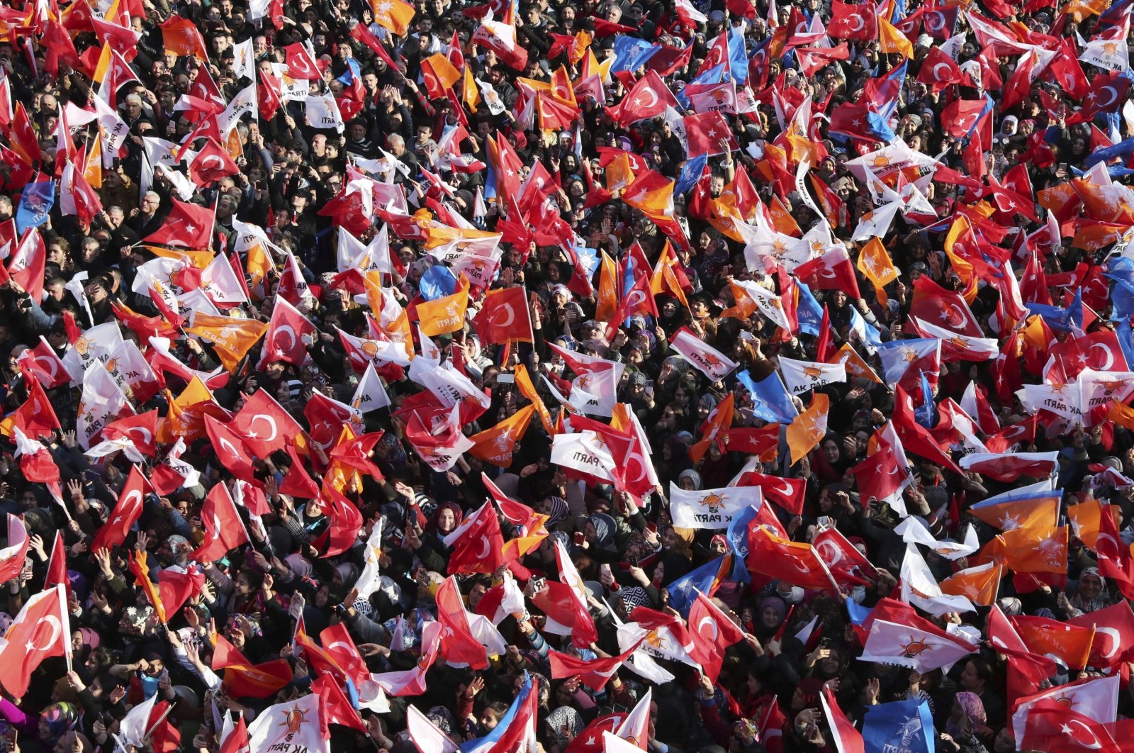 Supporters of the ruling Justice and Development Party (AK Party) wave Turkish and party flags during a rally in Bartın, Turkey, March 4, 2019. (AP Photo)