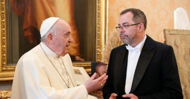 Pope Francis (L) meets with Ukraine's ambassador to the Vatican, Andriy Yurash, during a private audience at the Vatican, April 7, 2022. (Vatican Media via Reuters)