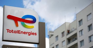 A sign with the logo of French oil and gas company TotalEnergies is pictured at a petrol station in Nantes, France, June 30, 2022. (Reuters Photo)
