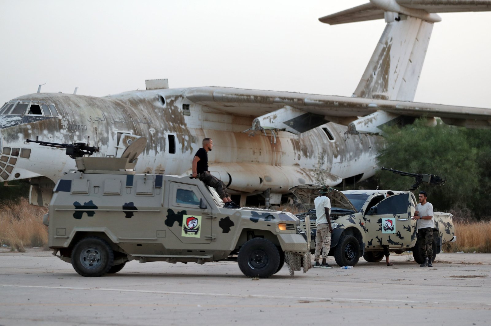 Joint forces affiliated with Libya&#039;s Government of National Unity, assemble inside the closed Tripoli International Airport as they deploy on the outskirts and entrances of the capital Tripoli, on August 16, 2022. (AFP Photo)