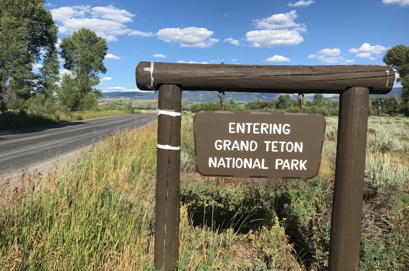A signpost greets travelers at the Gros Ventre entrance to Grand Teton National Park, in Jackson Hole, Wyoming, U.S., July 12, 2017. (Reuters Photo)