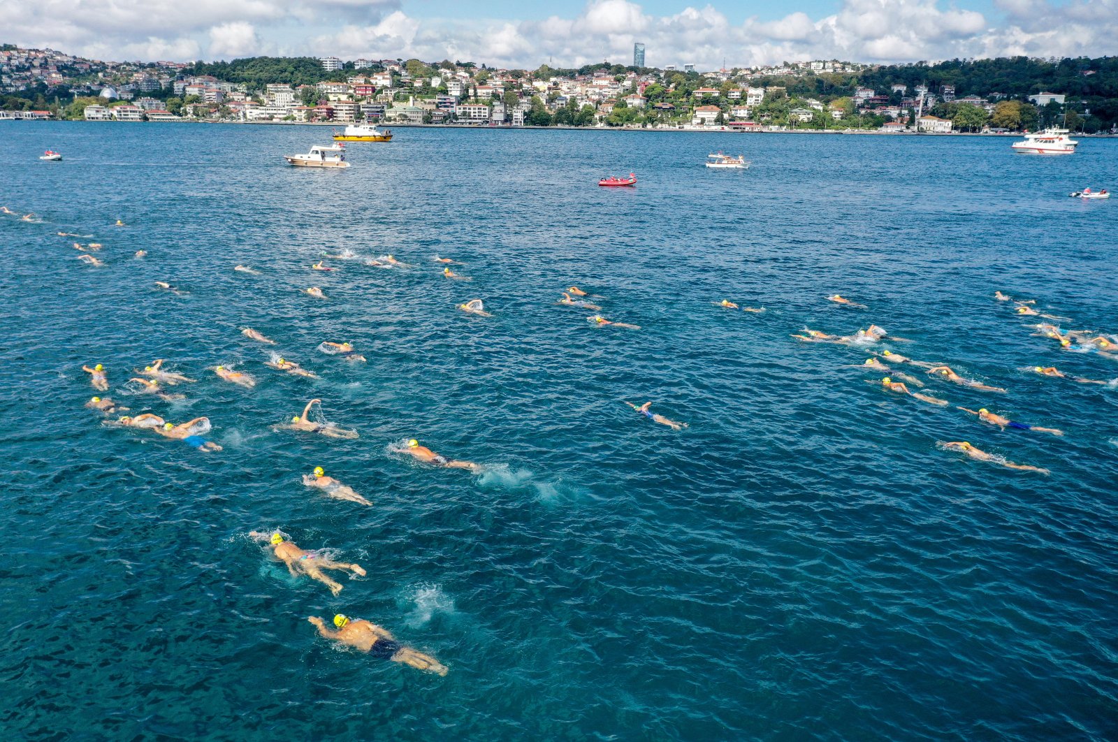 People participate in a swimming race across the Bosporus, in Istanbul, Türkiye, Aug. 21, 2022. (AA PHOTO)