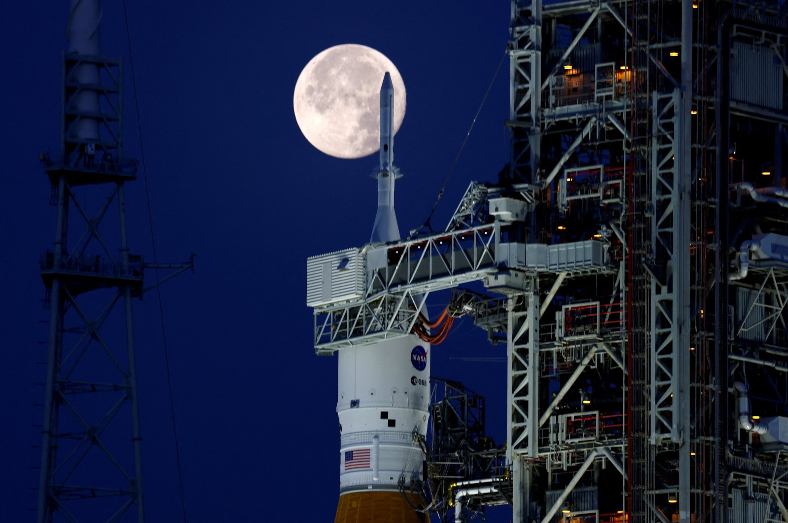 A full moon, known as the &quot;Strawberry Moon,&quot; with NASA’s next-generation moon rocket, the Space Launch System (SLS) Artemis 1, at the Kennedy Space Center in Cape Canaveral, Florida, U.S., June 15, 2022. (Reuters Photo)