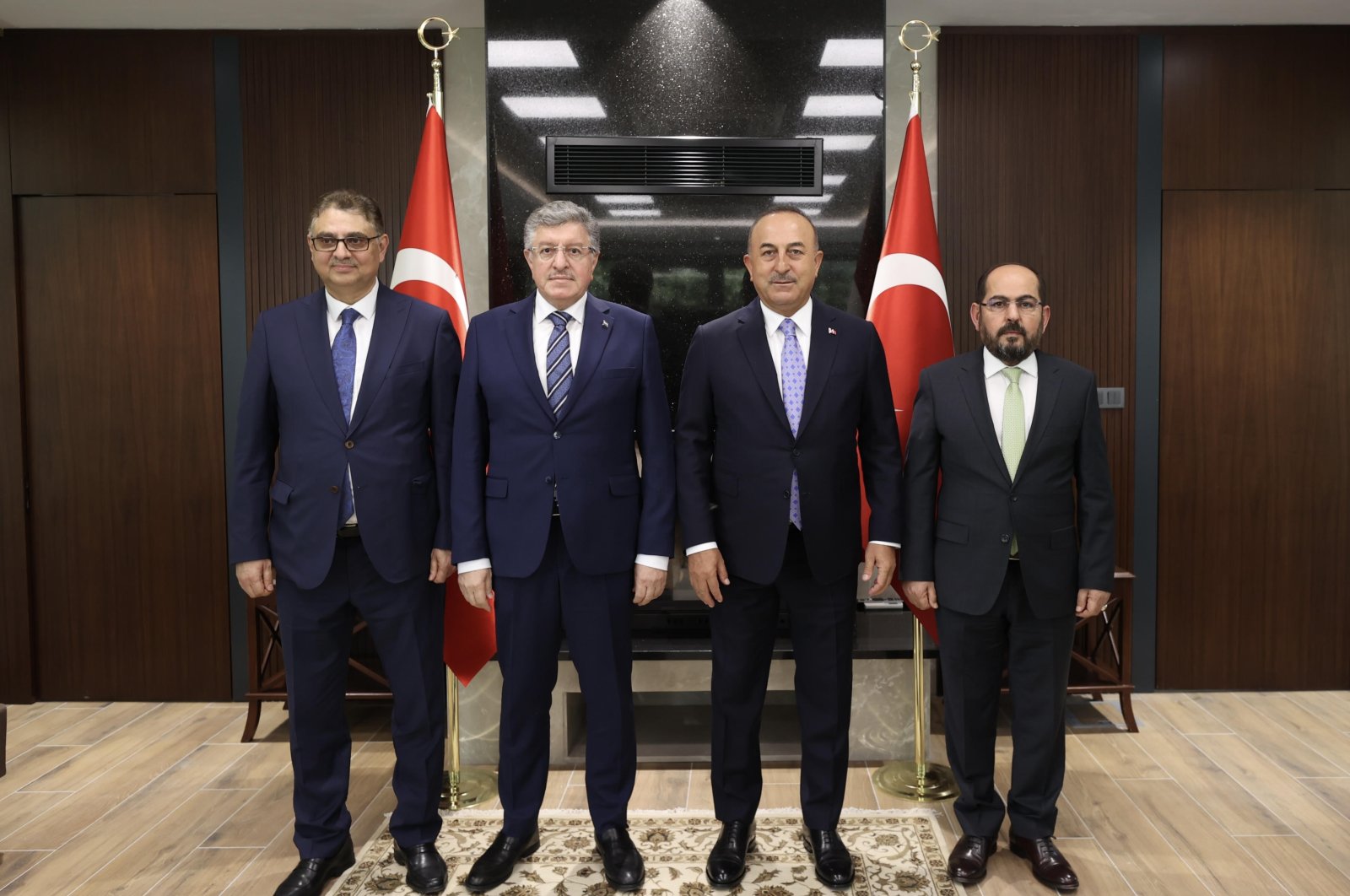 Turkish Foreign Minister Mevlüt Çavuşoğlu (C-R) meets with Syrian opposition officials in the capital Ankara, Türkiye, Aug. 24, 2022.