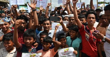 Rohingya refugees shout slogans during a &quot;Genocide Remembrance Day&quot; rally marking the fifth anniversary since fleeing Myanmar, at a refugee camp in Ukhia, Bangladesh, Aug. 25, 2022. (AFP Photo)