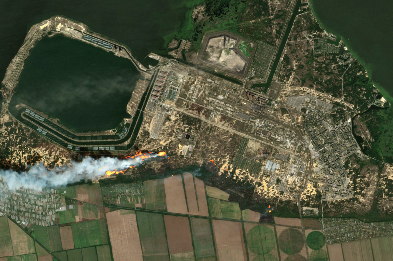 An aerial view of the Zaporizhzhia nuclear power plant and fires, in Enerhodar in the Zaporizhzhia region, Ukraine, Aug. 24, 2022. (Reuters Photo)