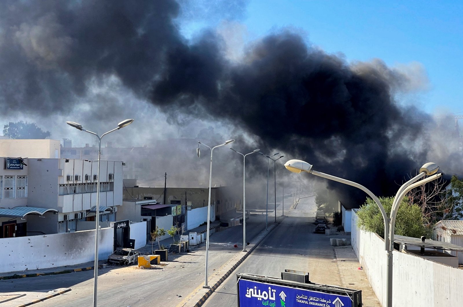 Smoke rises in the sky following clashes in Tripoli, Libya, Aug. 27, 2022. (Reuters Photo)